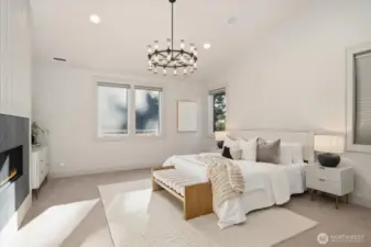 Vaulted ceilings in the Primary suite complete with romantic chandelier