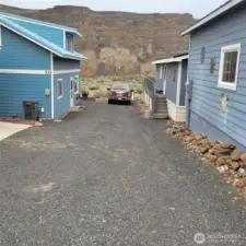 Very long driveway . Lots of parking plus RV parking.