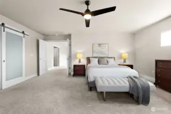 A sprawling primary suite includes a spacious bedroom, ensuite 5 piece bathroom and a large walk in closet.