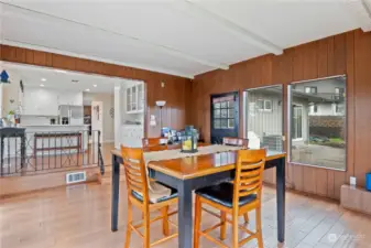 So slider to Deck on the left, DUTCH Door on right leads out to Patio