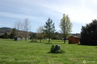 Well - Looking toward pump house and shed