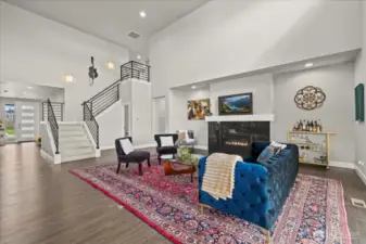Convenient half bathroom located by the stairs.
