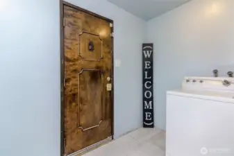 Another angle of the other side of the utility room and backdoor to the yard.