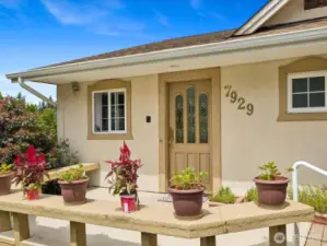 Lovely lakefront home greets guests on the Front Porch.