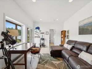 Lowest level Great Room with built-in counter & cabinets - with Door out to Patio, Backyard &  Dock - Welcome to the Lake!