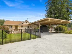 Large Driveway with covered Carport for 4 cars, electric car charging port +RV Parking space.