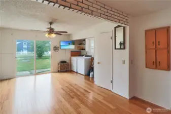 Versatile flex space with gorgeous bamboo flooring—perfect for hobbies,  entertaining, or relaxation.