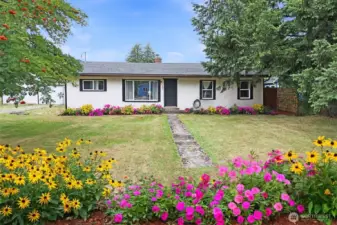 Double lot offers room to roam—enjoy extra space for gardening, hobbies, or simply  relaxing.