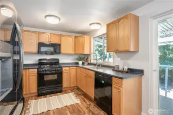 Newer sink & faucet, new lighting, gas stove