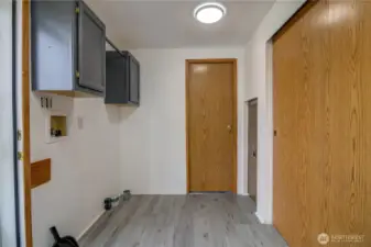 Laundry Space off the kitchen with more storage. Bathroom off of Laundry Room