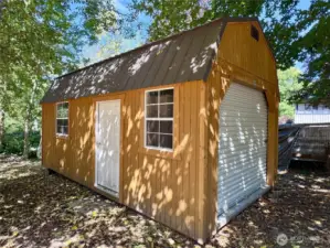 New barn shop with 8' loft, front rolling garage door, all on a slab.