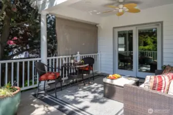 Covered deck and patio doors to informal living