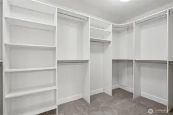 Primary bedroom walk-in closet