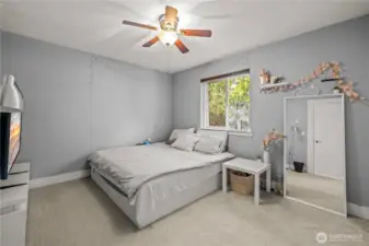 Enjoy two separate closets in the primary bedroom, plus a large window that brings in natural light. With only one shared wall, this room offers both privacy and openness.