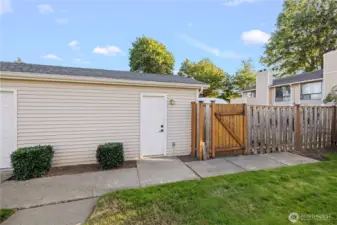 This home features a detached garage positioned at the front of the property with convenient guest parking available right in front. To access the residence, you’ll enter through a secure gate and fenced yard, offering both privacy and curb appeal. The garage provides plenty of room for storage as well as space for your vehicle, and it has future potential for an electric car charging station such as a Tesla charger.