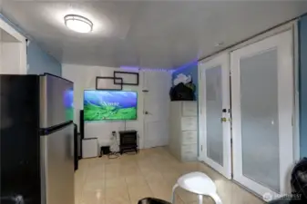 Downstairs TV area - Make it what you may need. Studio or office?