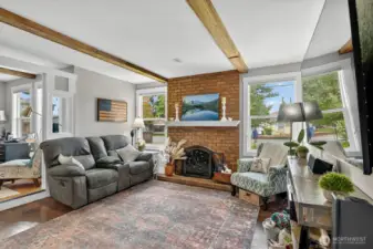 Another angle of the living room looking in towards an extra finished room.