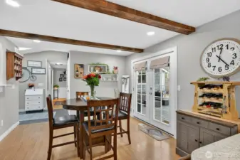 Looking from the kitchen through the dining room.
