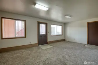 Garage entrance to the right.