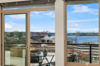 Sliding glass door leads to sizeable balcony, complete with storage closet.