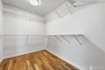 Large walk-in closet with additional storage room attached