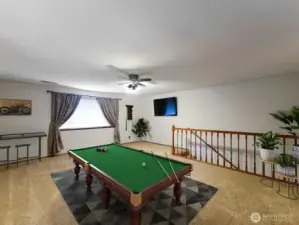 Staged upstairs bedroom or Recreation room.
