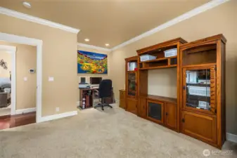 Versatile main floor flex space, currently used as a home office, provides the perfect area for remote work, hobbies or a reading room.