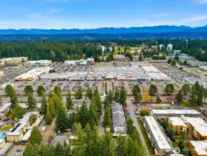 Fantastically located in a wooded setting directly across from Crossroads Mall, offering every amenity imaginable - restaurants, cinema, shopping, and essential services