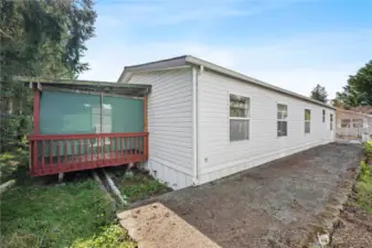 Backyard is private and perfect for relaxing in the screened porch this summer, get the twinkle lights going. Great side patio for the big bbq too!