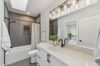 Hall bath (jack/jill) offers enough cabinets to store all your necessities.