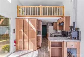 Small loft above the kitchen and bedroom.