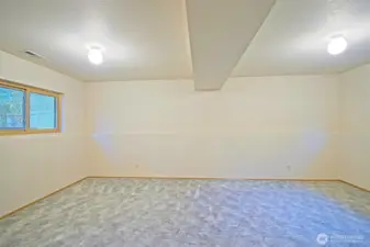 Huge rec room on the lower level.  SO many possibilities, tv room, play room, additional bedroom, home gym, and/or home office to mention a few.