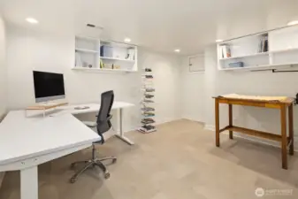 A previously under-utilized room was converted into this designer's-own home office.  Heated floors and great lighting make this a very warm and inviting workspace.