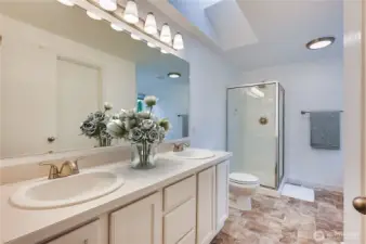 Primary bathroom with double sinks, walk-in closet, soaking tub and separate shower!