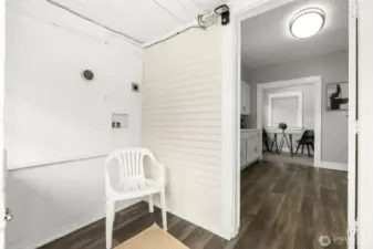 Enclosed back porch entrance.
