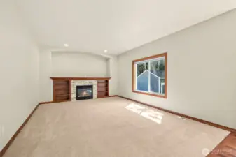 Great room living space with custom fireplace
