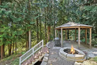 Stairs leading to year round spring fed pond on adjacent property