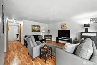 Small hallway leads you into main living space. Open and bright.