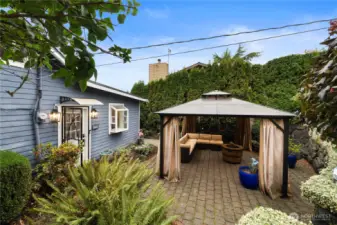 Easy to maintain patio with a water feature and open area for entertaining.