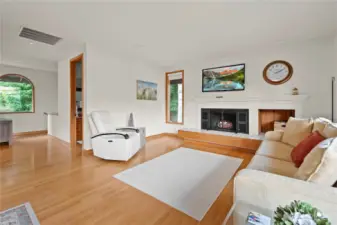 Beautiful hardwood flooring throughout the main living area.