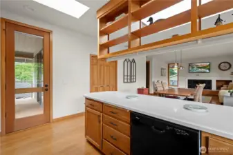 The large 8' tall glass door leads to the beautiful covered deck.