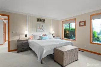 The large primary bedroom on lower level with beautiful windows to enjoy the view and the lovely garden. See virtual tour link for 3D walkthrough and interactive floor plans.