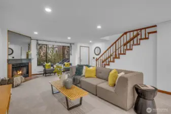 Such a great space to entertain friends.  Open concept allows flow and function. Can lighting makes the space feel open and inviting. New carpet and interior paint.