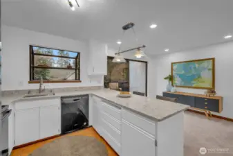 Quartz counters, garden window, tile floors with new lighting and deep 1 compartment stainless steel sink