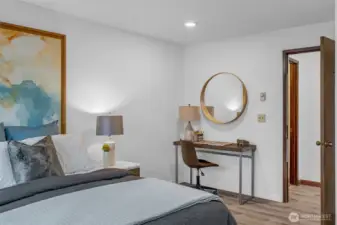 The primary bedroom faces west and get lots of natural light. Luxury vinyl plank flooring, new base molding and lighting.  Attached three quarter bath with walk in shower.  The two upper bedrooms are generously sized with room for desks or sitting areas.