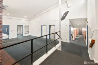 Stairs to the bedrooms and bonus rooms