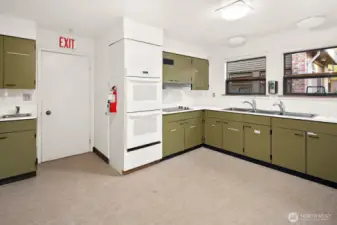 Kitchen features double ovens and  built in cooktop
