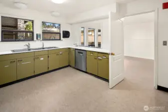 Great prep area with two faucets at three sinks. Plenty of storage space