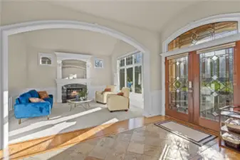 Stunning entry to the home with a slate entry, harwood floor inlays and all of the intricate finishes.