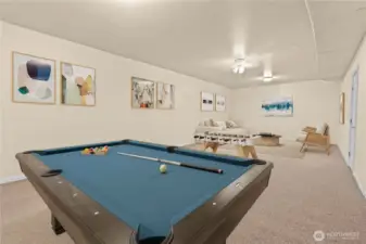 This fully finished room is virtually staged as a game room to show the possibilities if the space